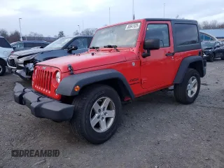 2015 Jeep Wrangler Willys Wheeler with VIN 1C4AJWAG9FL543998, listed as a Copart auction lot 88947025 with 142,433 mi miles and Salvage title. Bid and sale history available at DreamBid. Image 1.