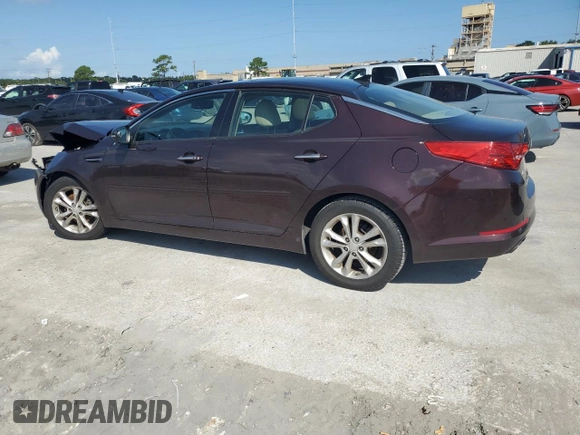 2013 Kia Optima EX z VIN 5XXGN4A70DG186128, wystawiony jako Copart lot #65836315 z przebiegiem 124 488 mil mil oraz Czysty tytuł • Clean title. Historia ofert i sprzedaży dostępna na DreamBid. Obrazek 2.