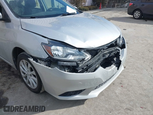 2019 Nissan Sentra S with VIN 3N1AB7AP0KY356477, listed as a IAAI auction lot 41595916 with 58,866 mi miles and . Bid and sale history available at DreamBid. Image 6.