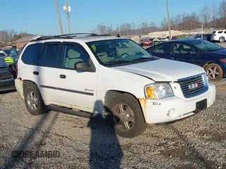 2006 GMC Envoy SLE with VIN 1GKDT13S662192005, listed as a IAAI auction lot 41483764 with 138,113 mi miles. Bid and sale history available at carsss.com. Image 1.