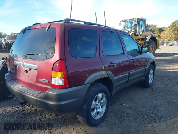2003 Mazda Tribute ES with VIN 4F2CZ96183KM35719, listed as a IAAI auction lot 40611399 with 136,374 mi miles. Bid and sale history available at carsss.com. Image 4.