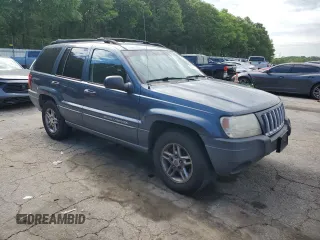 2004 Jeep Grand Cherokee Laredo with VIN 1J4GX48S24C216941, listed as a Copart auction lot 55584785 with 279,710 mi miles and Salvage title. Bid and sale history available at DreamBid. Image 4.