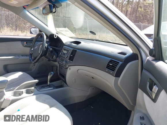 2007 Kia Optima EX with VIN KNAGE124975157963, listed as a IAAI auction lot 41673886 with 128,278 mi miles. Bid and sale history available at carsss.com. Image 5.