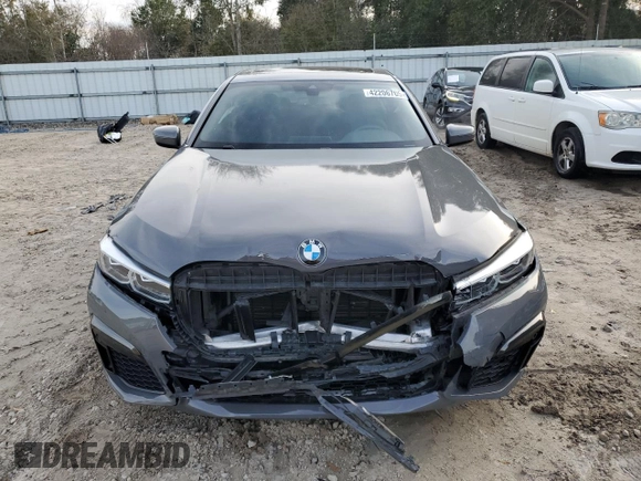 2020 BMW 7 Series 740i with VIN WBA7T2C06LCD15613, listed as a Copart auction lot 42206705 with 76,520 mi miles and Salvage Title. Bid and sale history available at carsss.com. Image 5.