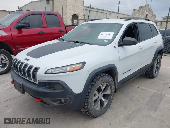 2015 Jeep Cherokee Trailhawk with VIN 1C4PJMBS9FW623740, listed as a IAAI auction lot 42131019 with 155,105 mi miles and . Bid and sale history available at DreamBid. Image 17.
