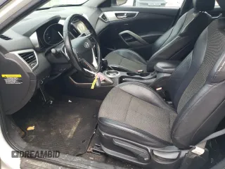 2013 Hyundai Veloster w/Gray Int с VIN KMHTC6AD3DU164555, выставлен на аукционе Copart как лот 54487605 с пробегом 146 134 миль миль и Списание • Salvage title. История ставок и продаж доступна на DreamBid. Изображение 7.