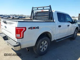 2015 Ford F-150 XLT with VIN 1FTEW1EFXFKE27190, listed as a IAAI auction lot 41670252 with 250,077 mi miles. Bid and sale history available at carsss.com. Image 4.