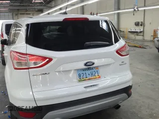 2016 Ford Escape SE z VIN 1FMCU0GX3GUC30456, wystawiony jako IAAI lot #42339656 z przebiegiem 99 033 mil mil oraz . Historia ofert i sprzedaży dostępna na DreamBid. Obrazek 1.