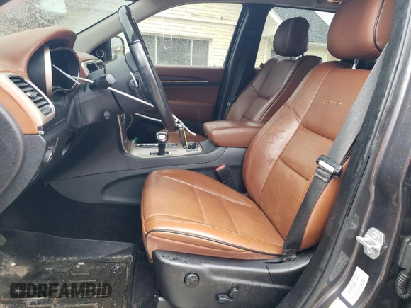 2015 Jeep Grand Cherokee Summit with VIN 1C4RJFJGXFC150773, listed as a Copart auction lot 50631975 with 171,809 mi miles and Salvage Title. Bid and sale history available at carsss.com. Image 7.