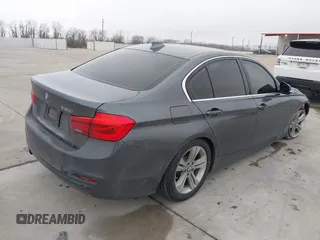 2017 BMW 3 Series 330i with VIN WBA8B9G30HNU52964, listed as a IAAI auction lot 41538624 with 96,997 mi miles. Bid and sale history available at carsss.com. Image 4.
