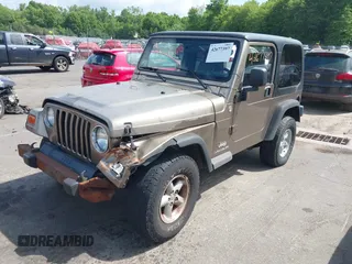 2005 Jeep Wrangler Sport with VIN 1J4FA49SX5P317120, listed as a IAAI auction lot 42677397 with 71,403 mi miles and . Bid and sale history available at DreamBid. Image 20.