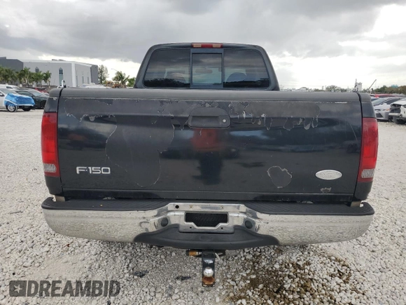 2000 Ford F-150 XL with VIN 1FTZX1721YNC09536, listed as a Copart auction lot 52645405 with 120,638 mi miles and Salvage Title. Bid and sale history available at carsss.com. Image 6.