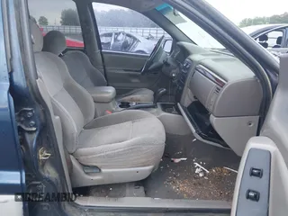 2000 Jeep Grand Cherokee Laredo with VIN 1J4G248S4YC144404, listed as a IAAI auction lot 42114635 with 181,854 mi miles and . Bid and sale history available at DreamBid. Image 5.