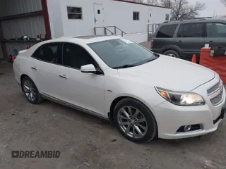 2013 Chevrolet Malibu LTZ with VIN 1G11H5SA7DF127467, listed as a IAAI auction lot 41192477 with 138,344 mi miles and . Bid and sale history available at DreamBid. Image 1.