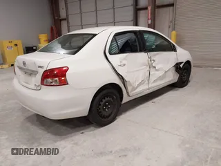 2009 Toyota Yaris with VIN JTDBT903994054207, listed as a IAAI auction lot 41991534 with 176,820 mi miles. Bid and sale history available at carsss.com. Image 4.