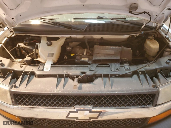 2014 Chevrolet Express Passenger LT with VIN 1GAZG1FG6E1126290, listed as a Copart auction lot 76689113 with 120,518 mi miles and Salvage Title. Bid and sale history available at carsss.com. Image 12.