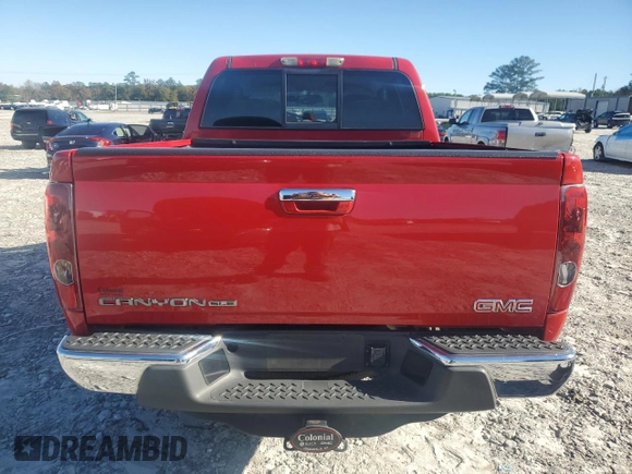 2012 GMC Canyon z VIN 1GTH5PFE8C8123177, wystawiony jako Copart lot #80241374 z przebiegiem 120 537 mil mil oraz Szkoda całkowita • Salvage title. Historia ofert i sprzedaży dostępna na DreamBid. Obrazek 6.