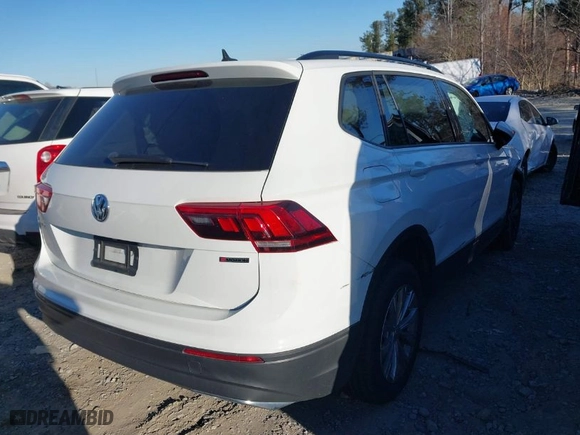 2020 Volkswagen Tiguan S with VIN 3VV0B7AX1LM155996, listed as a IAAI auction lot 41632155 with 76,000 mi miles. Bid and sale history available at carsss.com. Image 4.