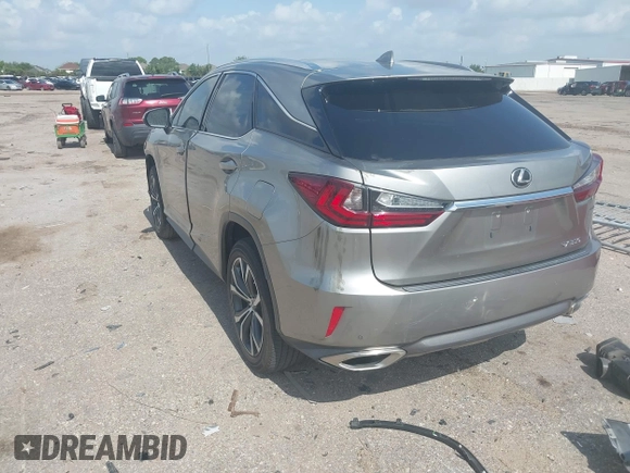 2019 Lexus RX 350 z VIN 2T2ZZMCA3KC123630, wystawiony jako IAAI lot #42436711 z przebiegiem 63 989 mil mil oraz . Historia ofert i sprzedaży dostępna na DreamBid. Obrazek 3.
