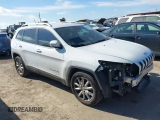 2016 Jeep Cherokee Limited with VIN 1C4PJLDB8GW256788, listed as a IAAI auction lot 41657339 with 104,630 mi miles. Bid and sale history available at carsss.com. Image 1.