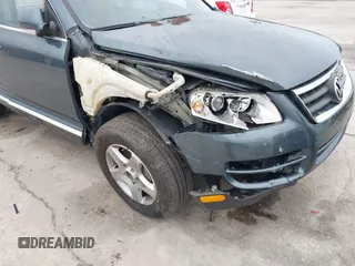 2007 Volkswagen Touareg V6 with VIN WVGZE77L97D011501, listed as a IAAI auction lot 41407720 with Not Provided miles and . Bid and sale history available at DreamBid. Image 6.