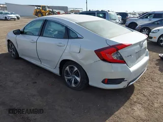 2019 Honda Civic Sedan LX with VIN 2HGFC2F62KH573149, listed as a IAAI auction lot 41575660 with 104,139 mi miles. Bid and sale history available at carsss.com. Image 3.