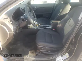 2010 Ford Fusion SE with VIN 3FAHP0HA7AR248040, listed as a Copart auction lot 52848545 with 148,721 mi miles and Salvage title. Bid and sale history available at DreamBid. Image 7.