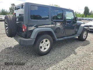 2013 Jeep Wrangler Unlimited Sport z VIN 1C4HJWDG2DL698061, wystawiony jako Copart lot #57823945 z przebiegiem 144 558 mil mil oraz Czysty tytuł • Clean title. Historia ofert i sprzedaży dostępna na DreamBid. Obrazek 3.