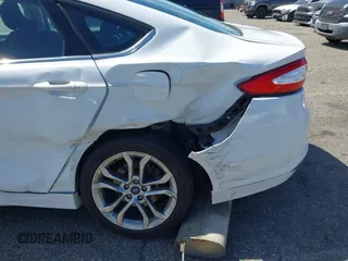 2016 Ford Fusion SE with VIN 3FA6P0H75GR284362, listed as a IAAI auction lot 42067568 with 132,557 mi miles and . Bid and sale history available at DreamBid. Image 14.