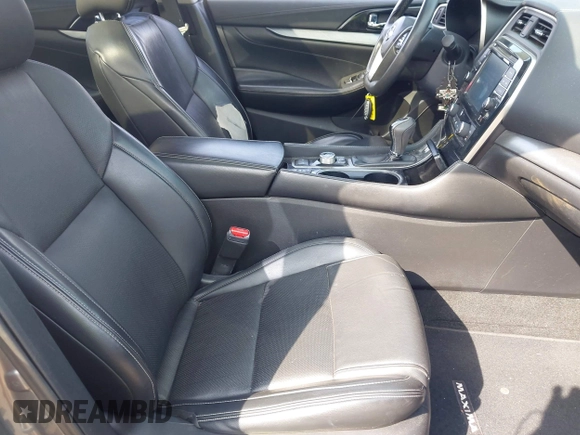2016 Nissan Maxima SL z VIN 1N4AA6AP8GC417817, wystawiony jako IAAI lot #41772451 z przebiegiem 78 880 mil mil oraz . Historia ofert i sprzedaży dostępna na DreamBid. Obrazek 5.