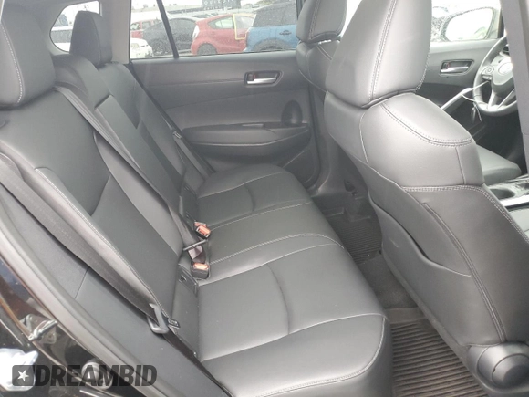 2024 Toyota Corolla Cross XLE with VIN 7MUDAAAG8RV095021, listed as a Copart auction lot 59232265 with 7,010 mi miles and Salvage title. Bid and sale history available at DreamBid. Image 11.