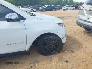 2019 Chevrolet Equinox Premier z VIN 2GNAXPEX9K6177386, wystawiony jako IAAI lot #42172103 z przebiegiem 61 045 mil mil oraz . Historia ofert i sprzedaży dostępna na DreamBid. Obrazek 19.