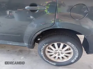 2008 Mercury Mariner Premier with VIN 4M2CU97198KJ30843, listed as a IAAI auction lot 42579794 with 109,983 mi miles and . Bid and sale history available at DreamBid. Image 12.