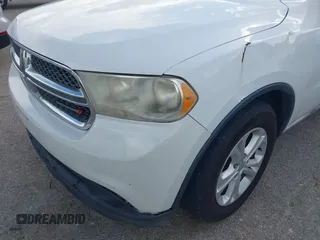 2013 Dodge Durango SXT with VIN 1C4RDHAG4DC667776, listed as a IAAI auction lot 42656299 with 204,181 mi miles and . Bid and sale history available at DreamBid. Image 6.
