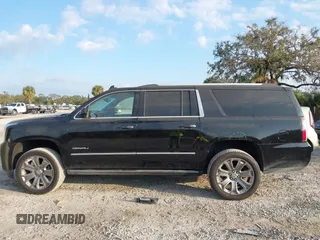 2019 GMC Yukon XL Denali with VIN 1GKS2HKJ2KR226275, listed as a IAAI auction lot 41552828 with 82,069 mi miles. Bid and sale history available at carsss.com. Image 15.