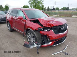 2024 Cadillac XT6 AWD Premium Luxury with VIN 1GYKPDRSXRZ724989, listed as a IAAI auction lot 42378559 with 22,520 mi miles and . Bid and sale history available at DreamBid. Image 1.