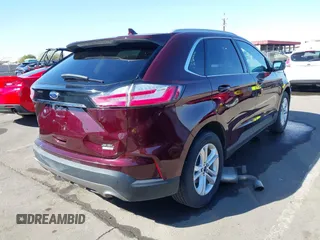 2019 Ford Edge SEL z VIN 2FMPK4J9XKBB10449, wystawiony jako IAAI lot #41614536 z przebiegiem 83 879 mil mil oraz . Historia ofert i sprzedaży dostępna na DreamBid. Obrazek 4.