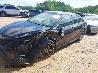 2018 Toyota Camry LE z VIN 4T1B11HKXJU652275, wystawiony jako IAAI lot #42245625 z przebiegiem 49 596 mil mil oraz . Historia ofert i sprzedaży dostępna na DreamBid. Obrazek 2.