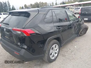 2019 Toyota RAV4 LE with VIN JTMF1RFV4KD030550, listed as a IAAI auction lot 40596628 with 92,318 mi miles and . Bid and sale history available at DreamBid. Image 4.
