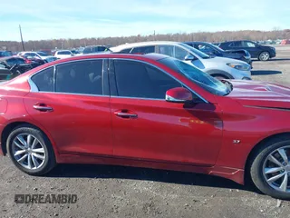 2014 Infiniti Q50 Premium with VIN JN1BV7AR4EM697482, listed as a IAAI auction lot 40844403 with 86,577 mi miles and . Bid and sale history available at DreamBid. Image 14.