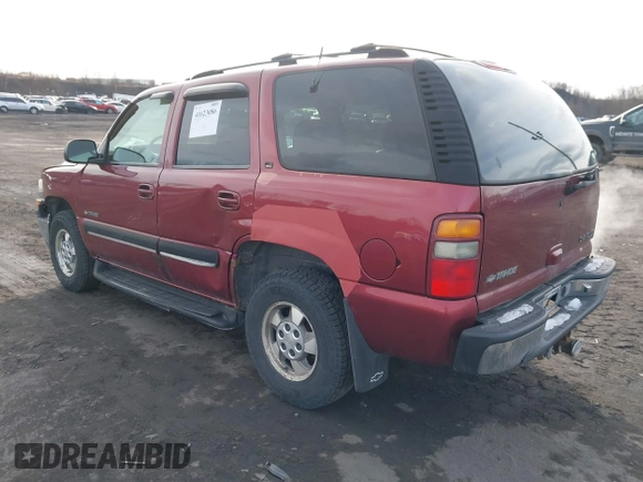 2001 Chevrolet Tahoe LT with VIN 1GNEK13TX1J281979, listed as a IAAI auction lot 41623086 with 297,509 mi miles. Bid and sale history available at carsss.com. Image 3.