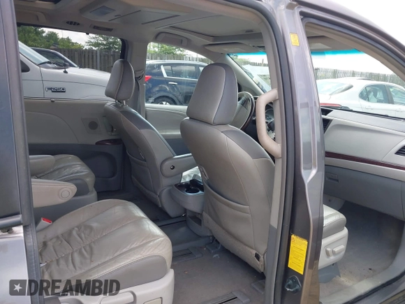 2011 Toyota Sienna XLE with VIN 5TDDK3DC2BS001541, listed as a IAAI auction lot 42731870 with 288,853 mi miles and . Bid and sale history available at DreamBid. Image 8.