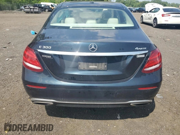 2017 Mercedes-Benz E 300 Luxury with VIN WDDZF4KBXHA185598, listed as a Copart auction lot 61011935 with 59,116 mi miles and Salvage title. Bid and sale history available at DreamBid. Image 6.