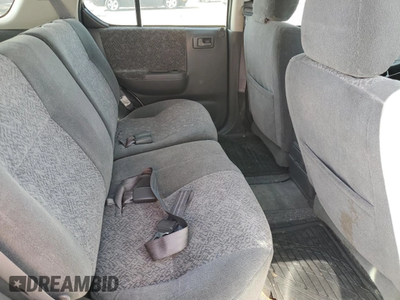 2000 Isuzu Rodeo S z VIN 4S2CK58W2Y4317915, wystawiony jako Copart lot #81780094 z przebiegiem 158 217 mil mil oraz Szkoda całkowita • Salvage title. Historia ofert i sprzedaży dostępna na DreamBid. Obrazek 10.