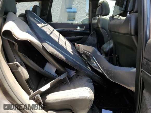 2014 Jeep Grand Cherokee Limited with VIN 1C4RJFBM3EC384398, listed as a Copart auction lot 57703835 with 153,255 mi miles and Salvage title. Bid and sale history available at DreamBid. Image 11.