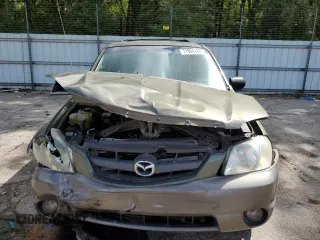 2002 Mazda Tribute LX with VIN 4F2YU09122KM55085, listed as a Copart auction lot 71604184 with 185,158 mi miles and Salvage Title. Bid and sale history available at carsss.com. Image 5.