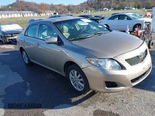 2009 Toyota Corolla with VIN 1NXBU40E59Z164488, listed as a IAAI auction lot 40907058 with 180,161 mi miles. Bid and sale history available at carsss.com. Image 1.