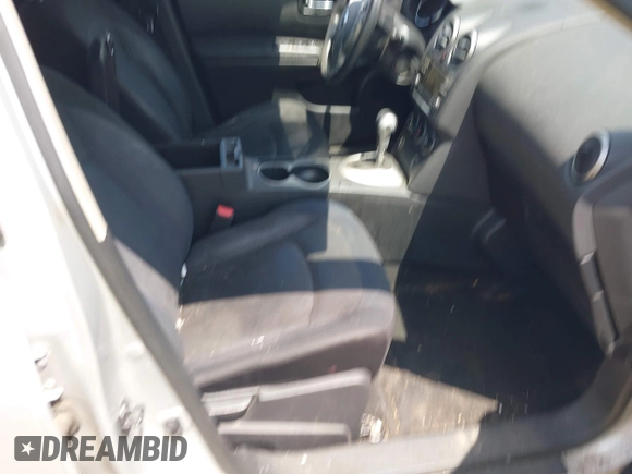 2013 Nissan Rogue S with VIN JN8AS5MTXDW023857, listed as a IAAI auction lot 42123229 with 209,145 mi miles and . Bid and sale history available at DreamBid. Image 5.
