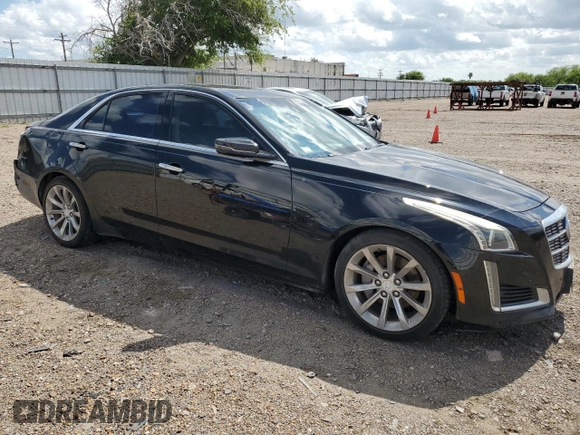 2014 Cadillac CTS Performance RWD with VIN 1G6AS5S33E0130965, listed as a Copart auction lot 60669564 with 28,435 mi miles and Salvage Title. Bid and sale history available at DreamBid. Image 4.