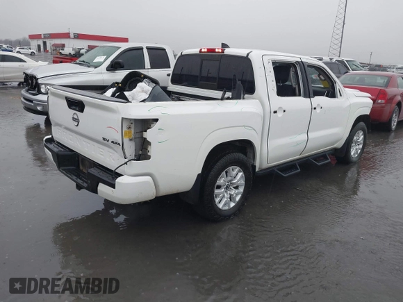 2022 Nissan Frontier Pro-4X with VIN 1N6ED1EK9NN608309, listed as a IAAI auction lot 41417258 with 33,615 mi miles and . Bid and sale history available at DreamBid. Image 4.